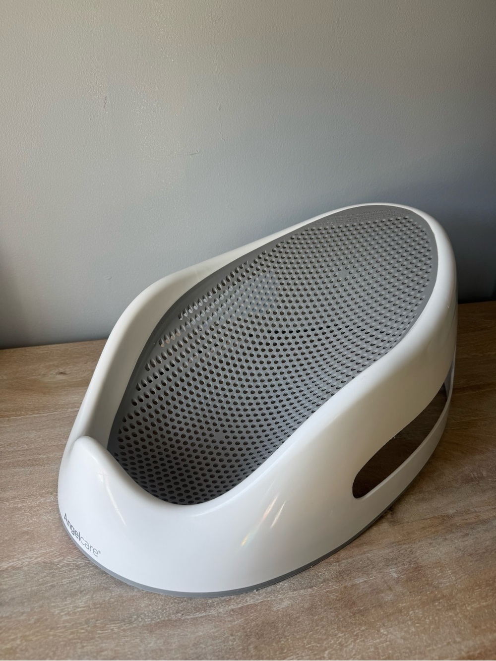 White and Gray Infant Bath Support - Brand: Not Clearly Visible